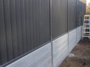 steve job concrete retaining under colorbond fence